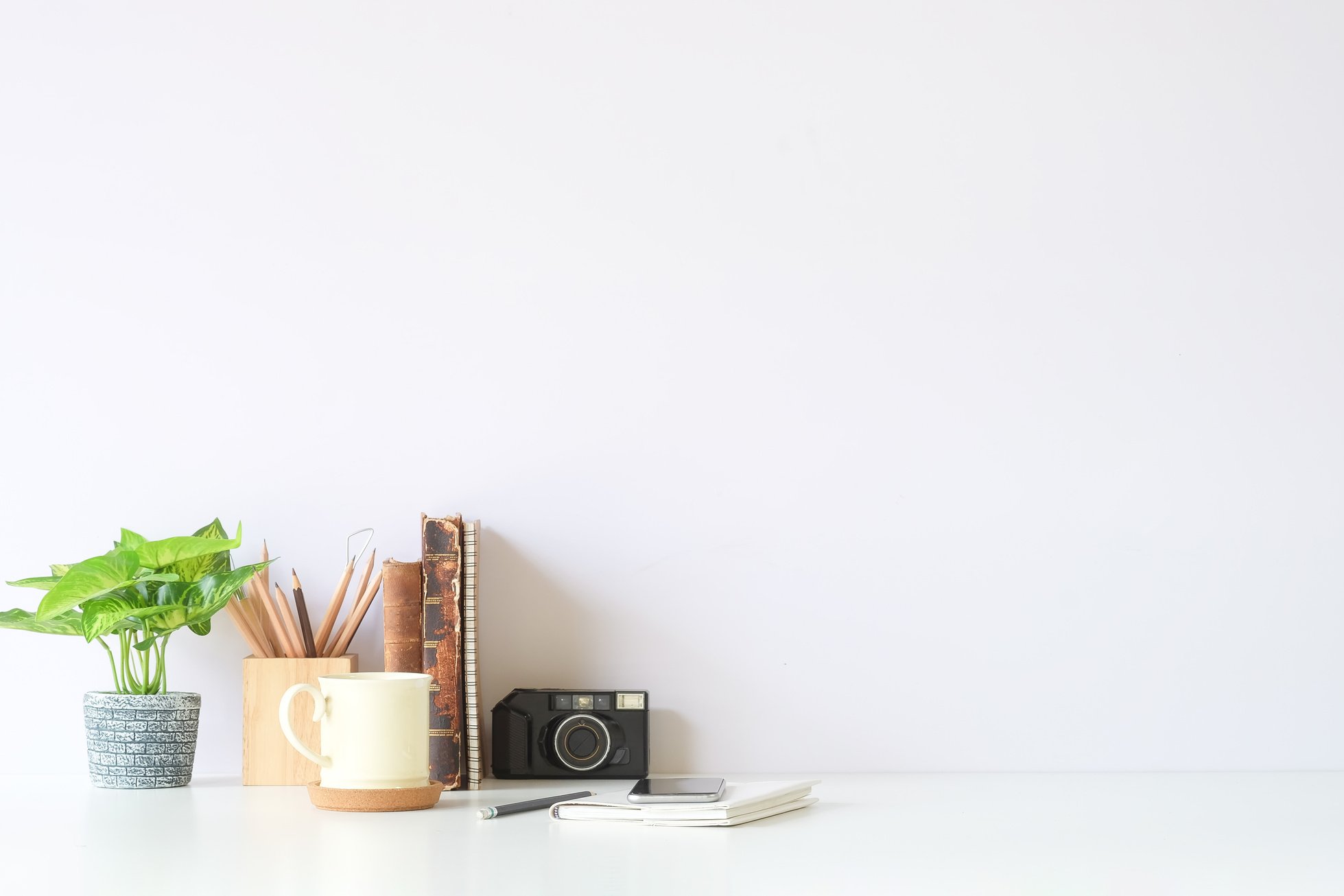 Home Office Supplies on White Desk 